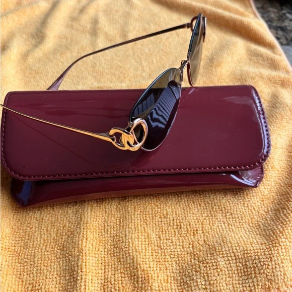 Pomellato Glossy Maroon Clutch Pomellato | Accessories | Pomellato Red Sunglasses | Poshmark main image 3